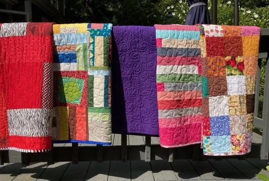 Charity Tops Quilted by Susan's Sister in Ohio