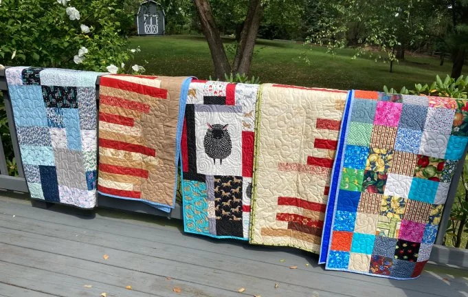 Charity Tops Quilted by Susan's Sister in Ohio