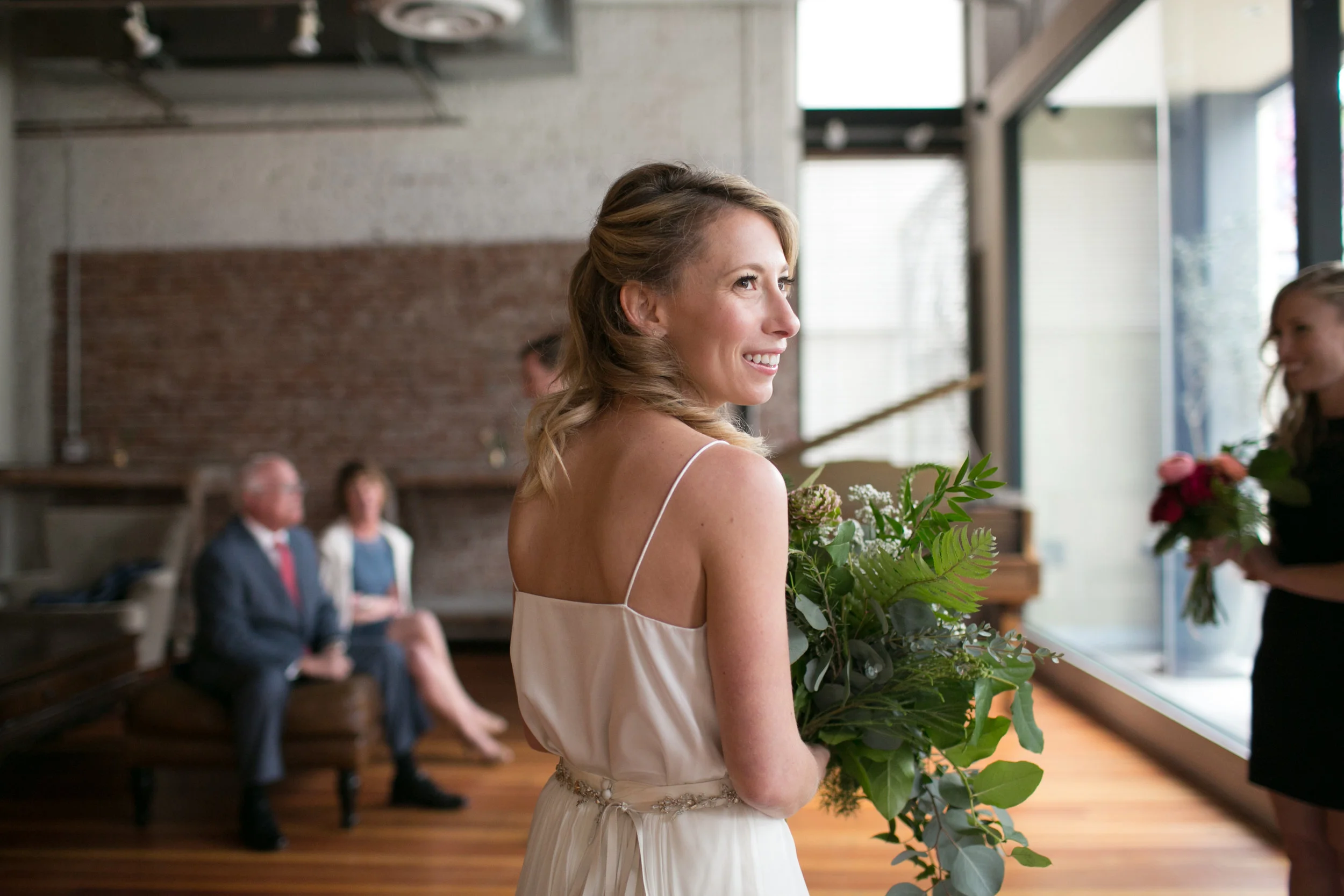 Bride and groom had a stunning navy and green winter wedding at The Loft On Pine in Long Beach, CA. The pops of rich colors matched the venues industrial vibe and the bride's giant bouquet of wild greens was pretty epic. The flowy BHLDN two piece paired with a leather jacket was perfect for the cooler weather but also looked pretty badass. Planning:@janealexandraevents Venue:@theloftonpine #JAE #longbeachweddingvenue #weddingplanning #theloftonpine #winterweddingideas