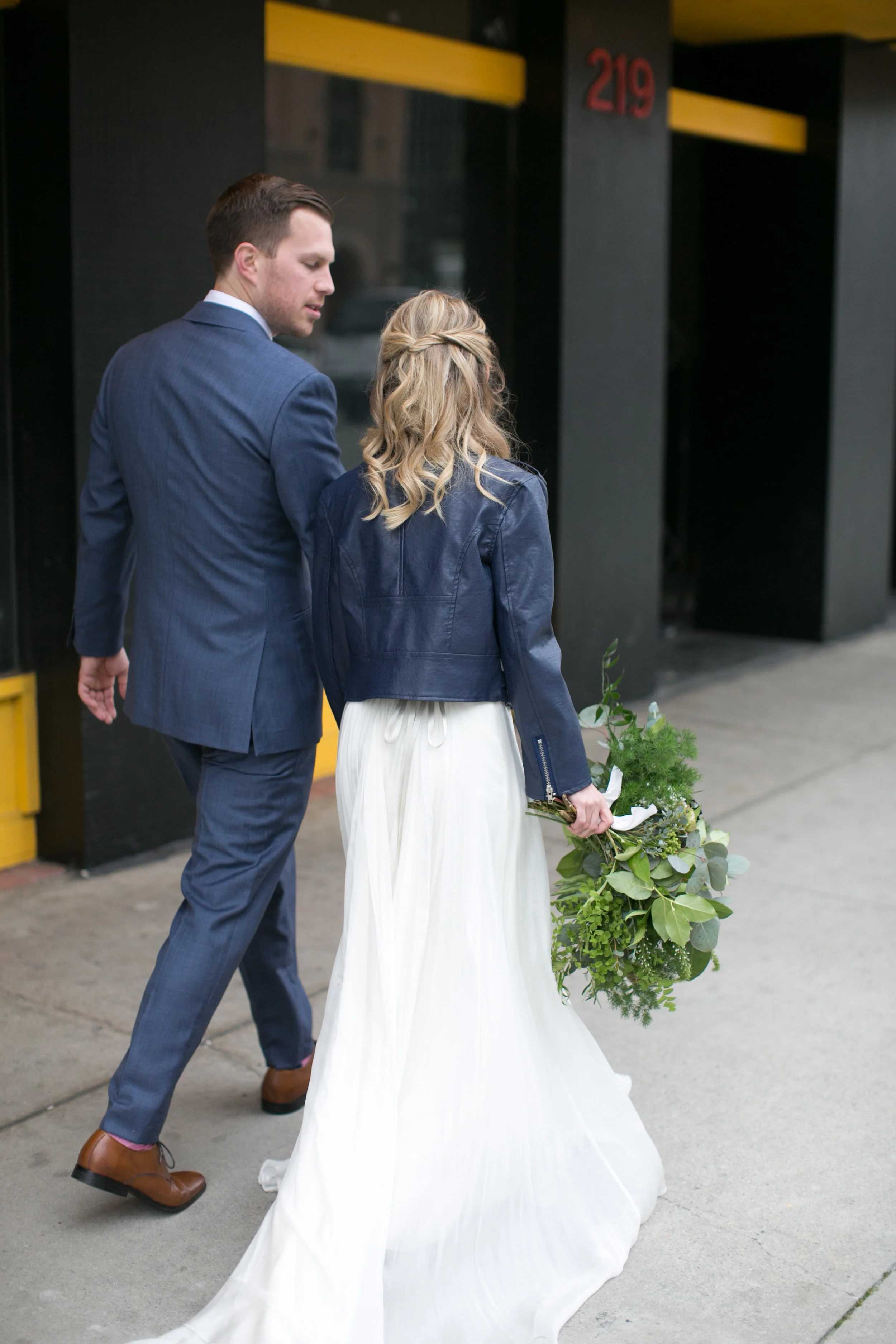 Bride and groom had a stunning navy and green winter wedding at The Loft On Pine in Long Beach, CA. The pops of rich colors matched the venues industrial vibe and the bride's giant bouquet of wild greens was pretty epic. The flowy BHLDN two piece paired with a leather jacket was perfect for the cooler weather but also looked pretty badass. Planning:@janealexandraevents Venue:@theloftonpine #JAE #longbeachweddingvenue #weddingplanning #theloftonpine #winterweddingideas