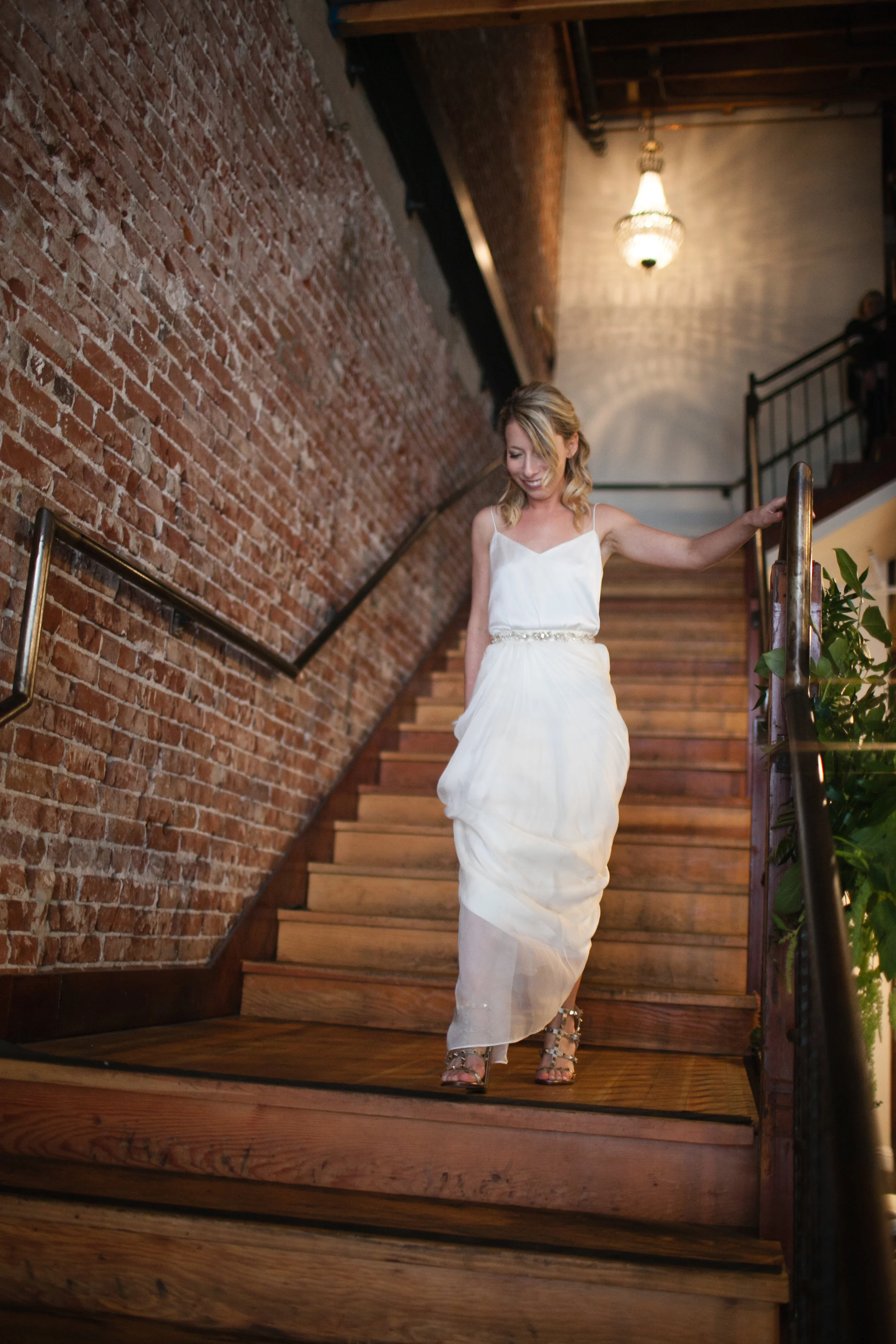 Bride and groom had a stunning navy and green winter wedding at The Loft On Pine in Long Beach, CA. The pops of rich colors matched the venues industrial vibe and the bride's giant bouquet of wild greens was pretty epic. The flowy BHLDN two piece paired with a leather jacket was perfect for the cooler weather but also looked pretty badass. Planning:@janealexandraevents Venue:@theloftonpine #JAE #longbeachweddingvenue #weddingplanning #theloftonpine #winterweddingideas