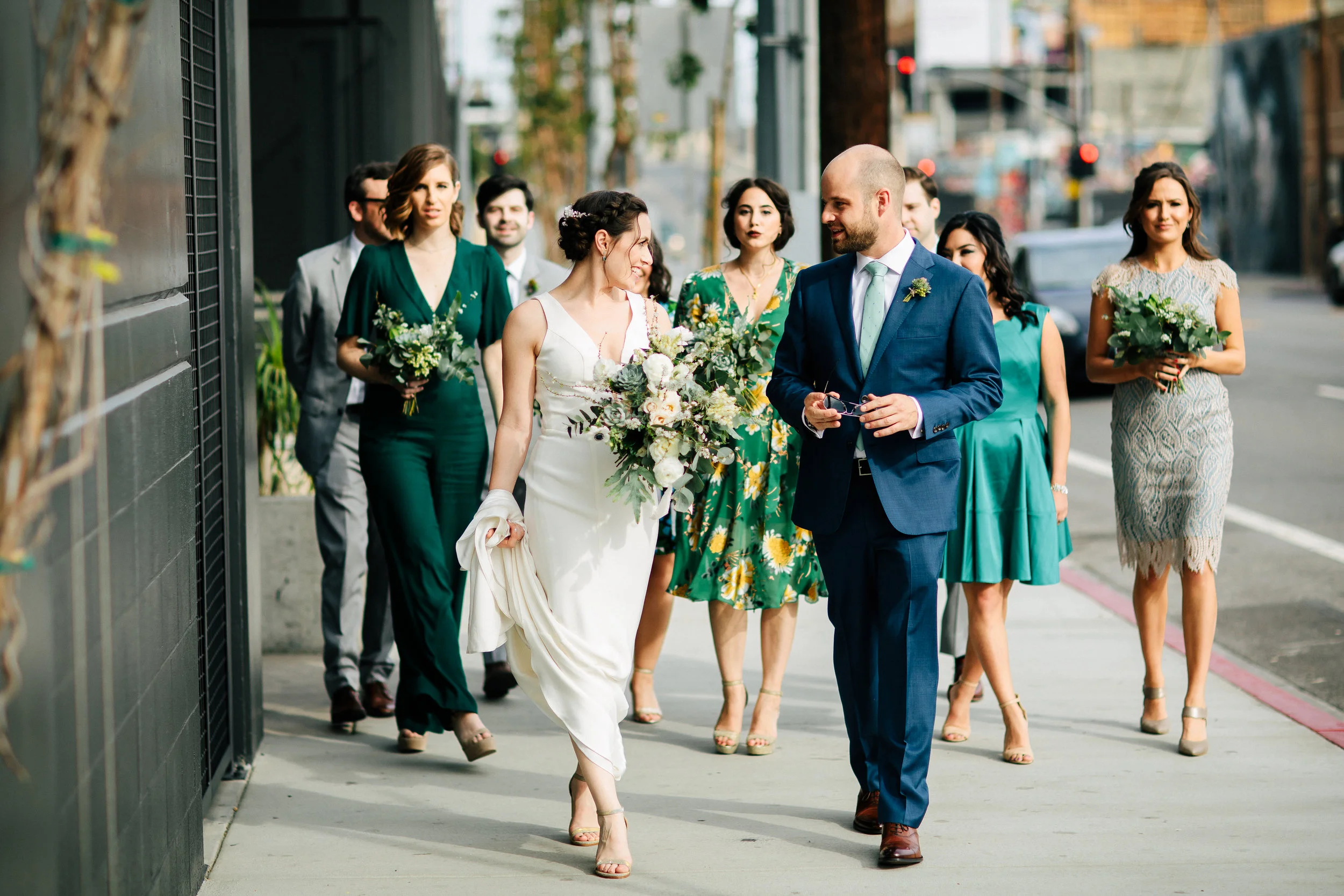 This DTLA wedding was inspired by Earth Day, it’s vibe was natural and minimal. The color palate is blue, green, rusty pinks and oranges. The LA bride had a custom wedding gown that was simply elegant. Rental furniture with velvet, wood matched the industrial #greenhouse of Millwick Wedding Venue in Los Angeles, CA. The florals were potted plants so they could be replanted post wedding. #JAE #janealexandraevents #dtlaweddingvenue #weddingplanning #losangeleswedding