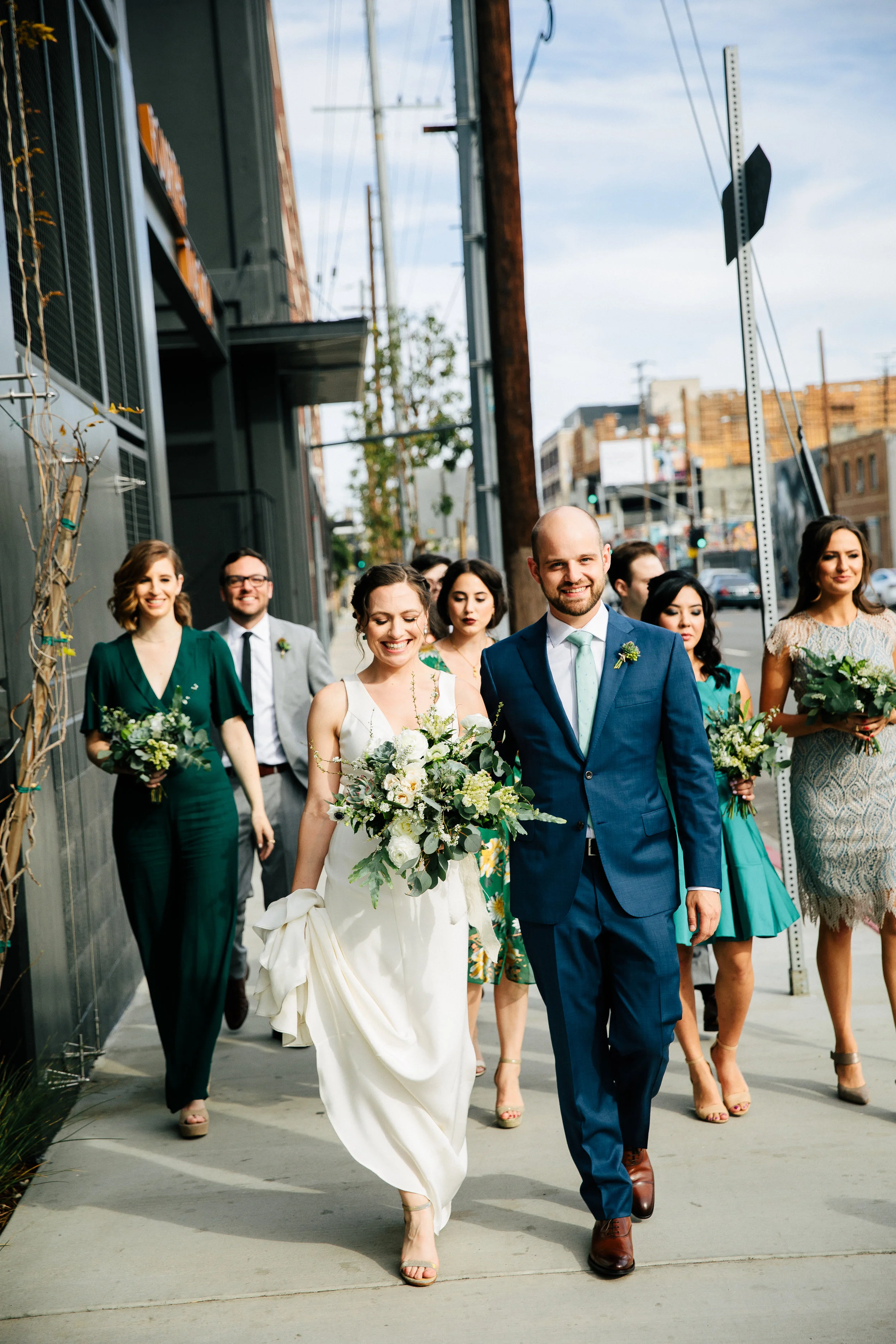 This DTLA wedding was inspired by Earth Day, it’s vibe was natural and minimal. The color palate is blue, green, rusty pinks and oranges. The LA bride had a custom wedding gown that was simply elegant. Rental furniture with velvet, wood matched the industrial #greenhouse of Millwick Wedding Venue in Los Angeles, CA. The florals were potted plants so they could be replanted post wedding. #JAE #janealexandraevents #dtlaweddingvenue #weddingplanning #losangeleswedding