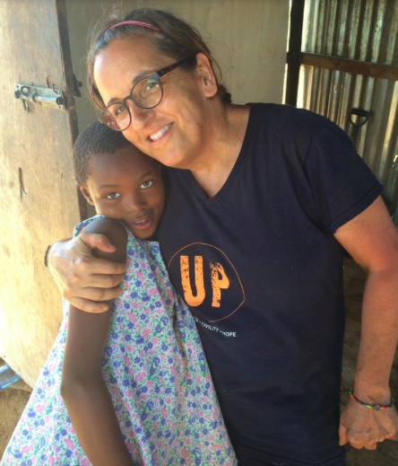 CUMmings with veronica, a grateful recipient of UP's efforts in south africa
