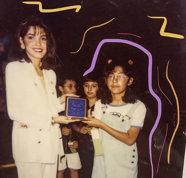 Me receiving first place at the State Spelling Bee competition.