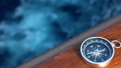 stock-footage-compass-on-ship-moving-in-morning-sea.jpg