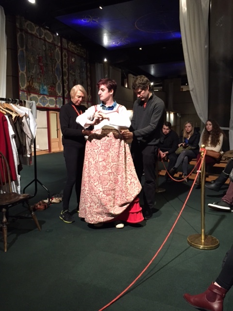 Colin, one of the students, getting costumed as Ophelia from Hamlet .