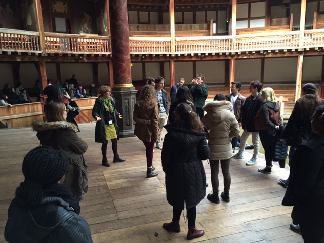 Standing onstage at The Globe with our workshop facilitator, Mary (green skirt).