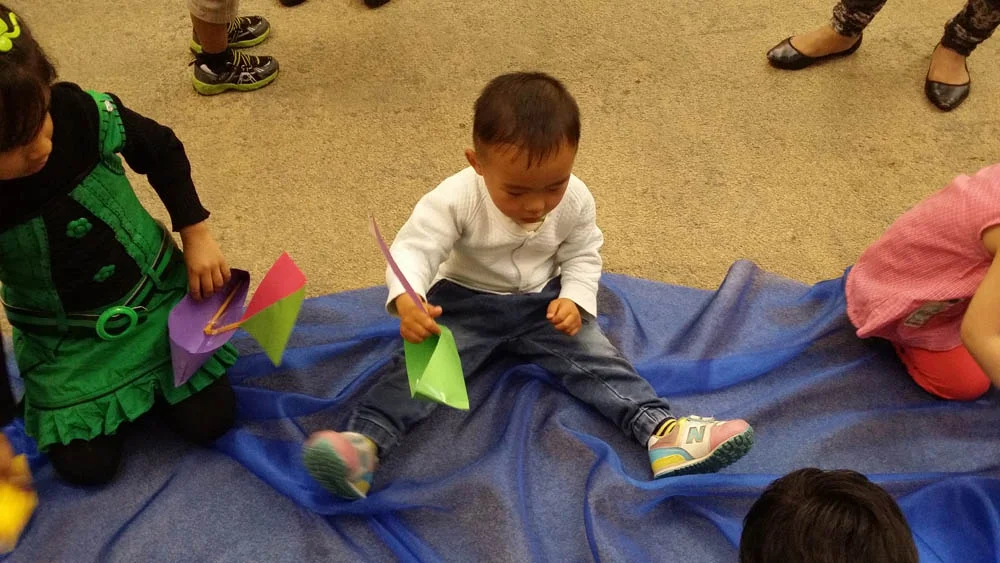 Playing with boats, 'A River' in Play Pod for State Library Victoria.