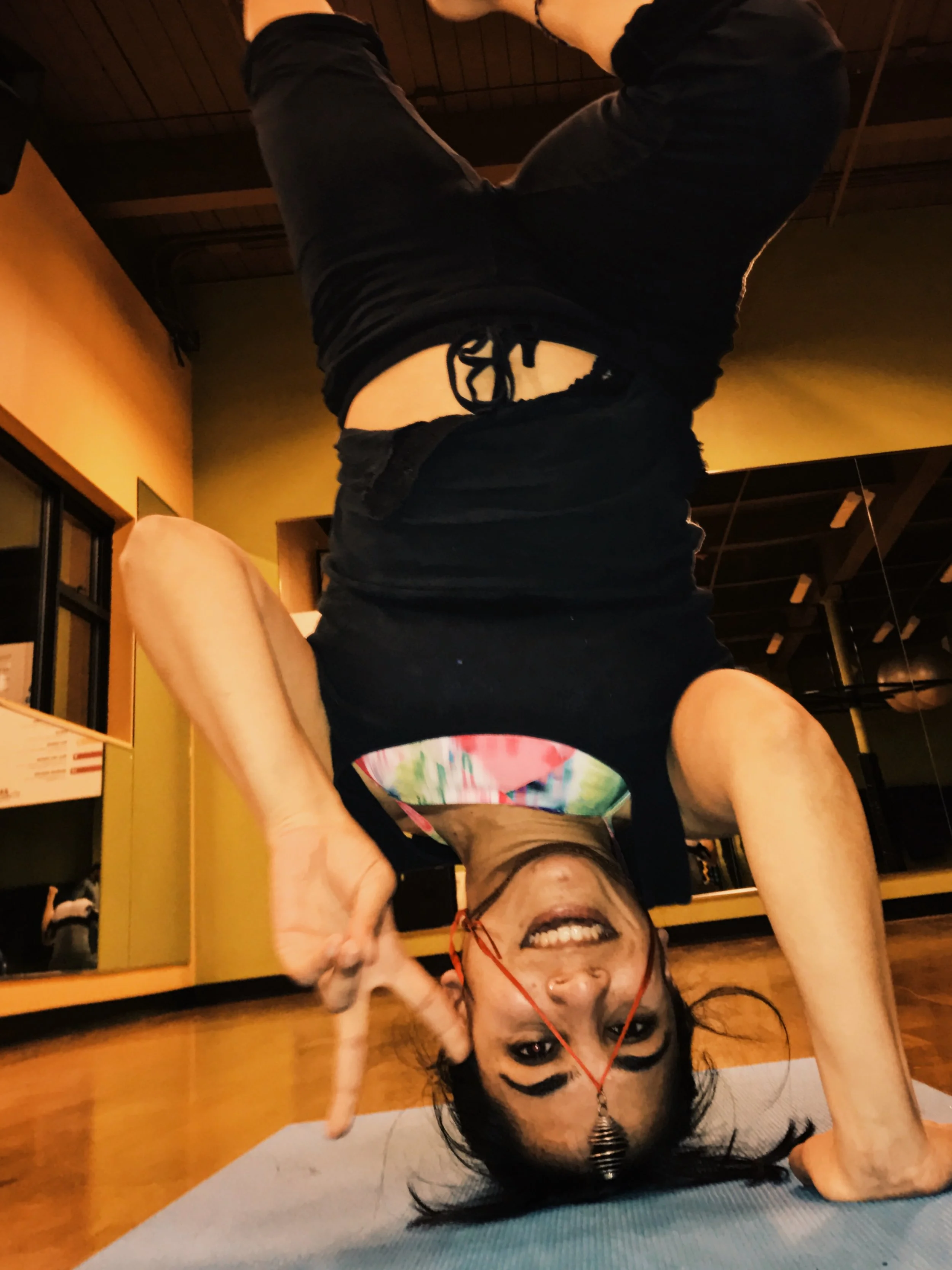 Happy Haji doing a happy handstand.