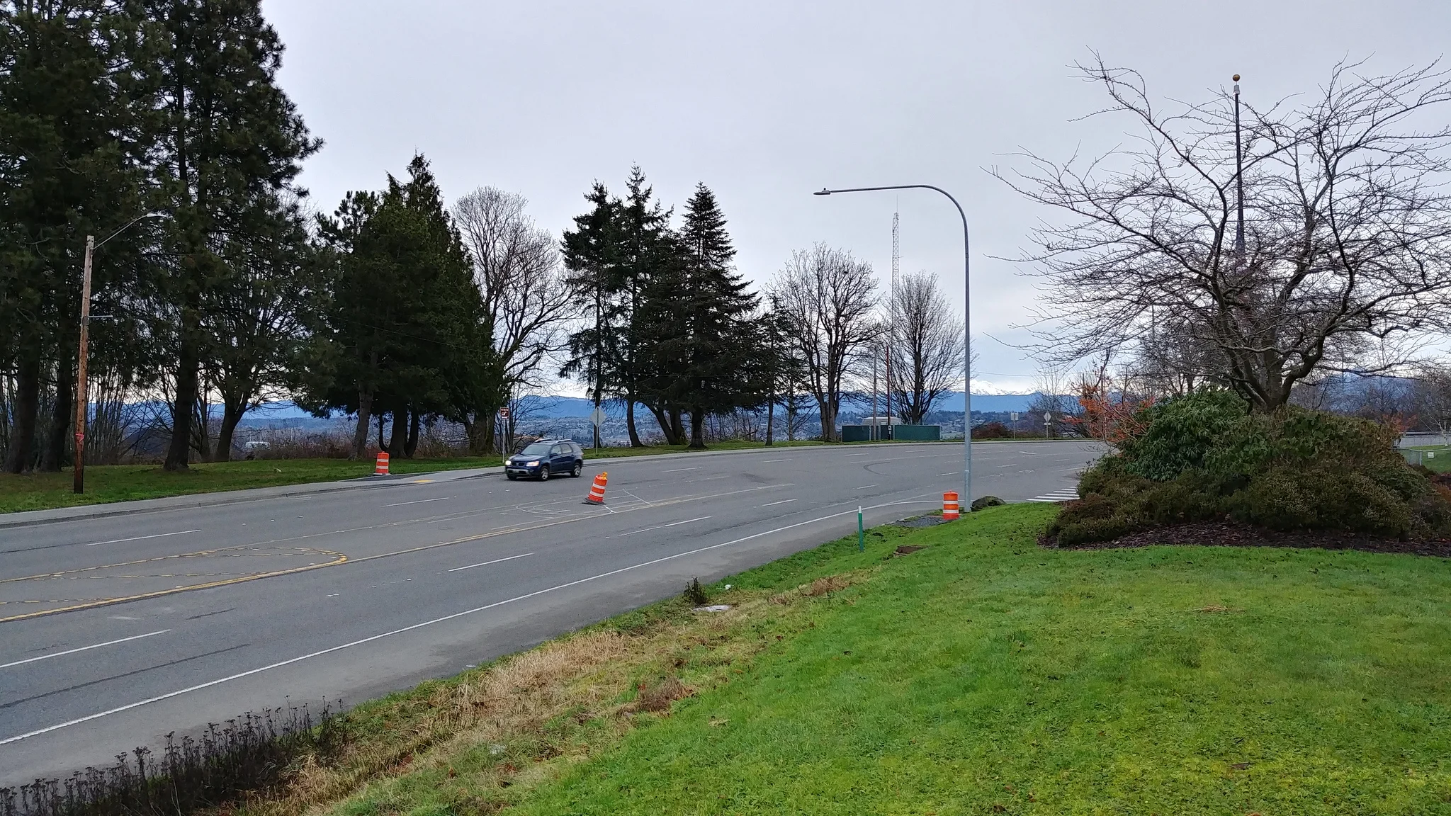 Orange barrels mark where the crosswalk will be. // Christopher Bragg