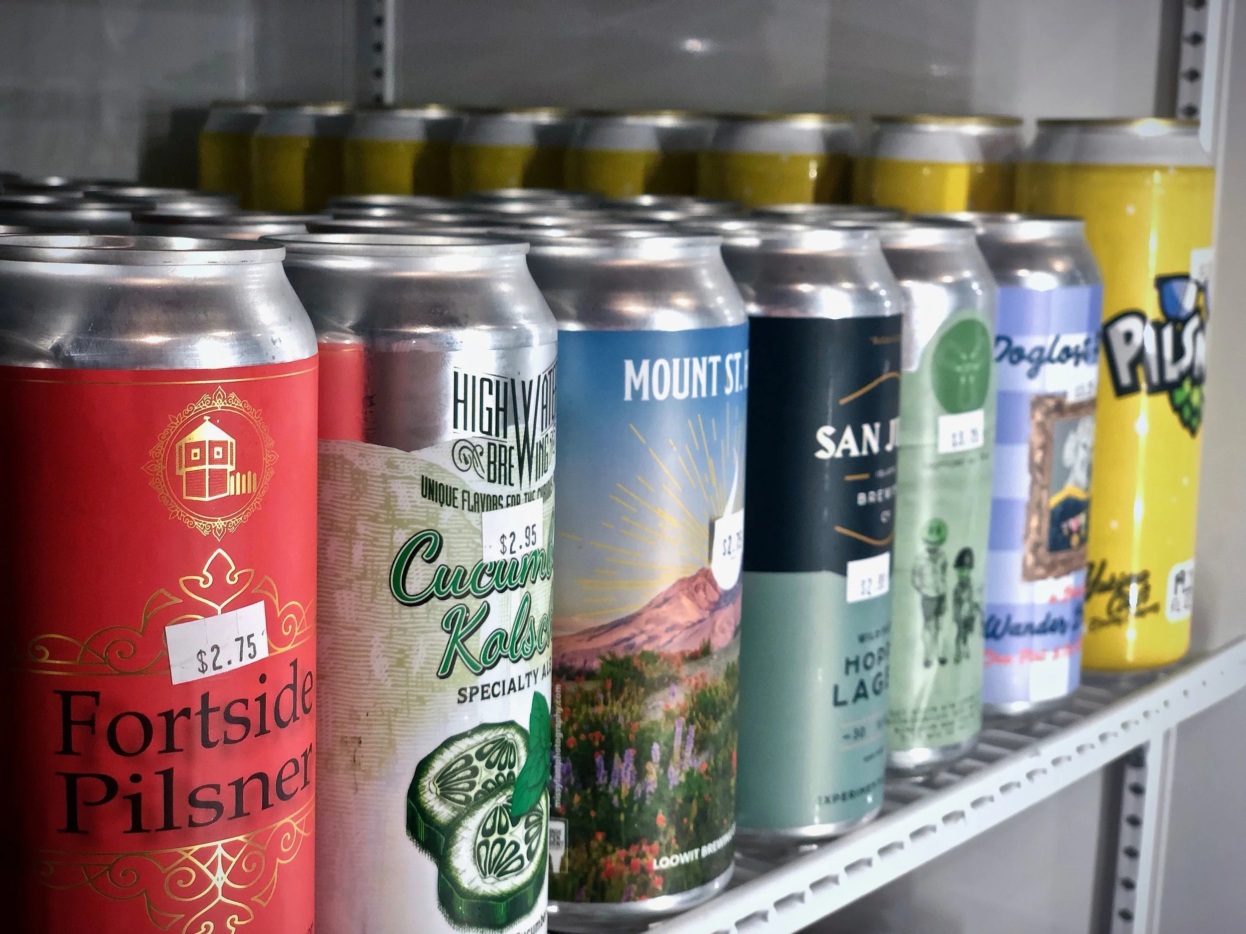 Cans at Toggle’s Bottle Shop ready to be enjoyed // Henry J
