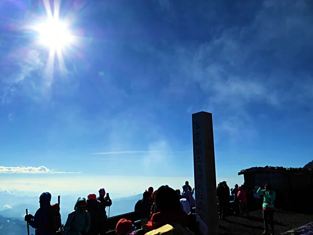  A stone monument of Kusushi Shrine stands high at the summit of Yoshidaguchi climbing trail 
