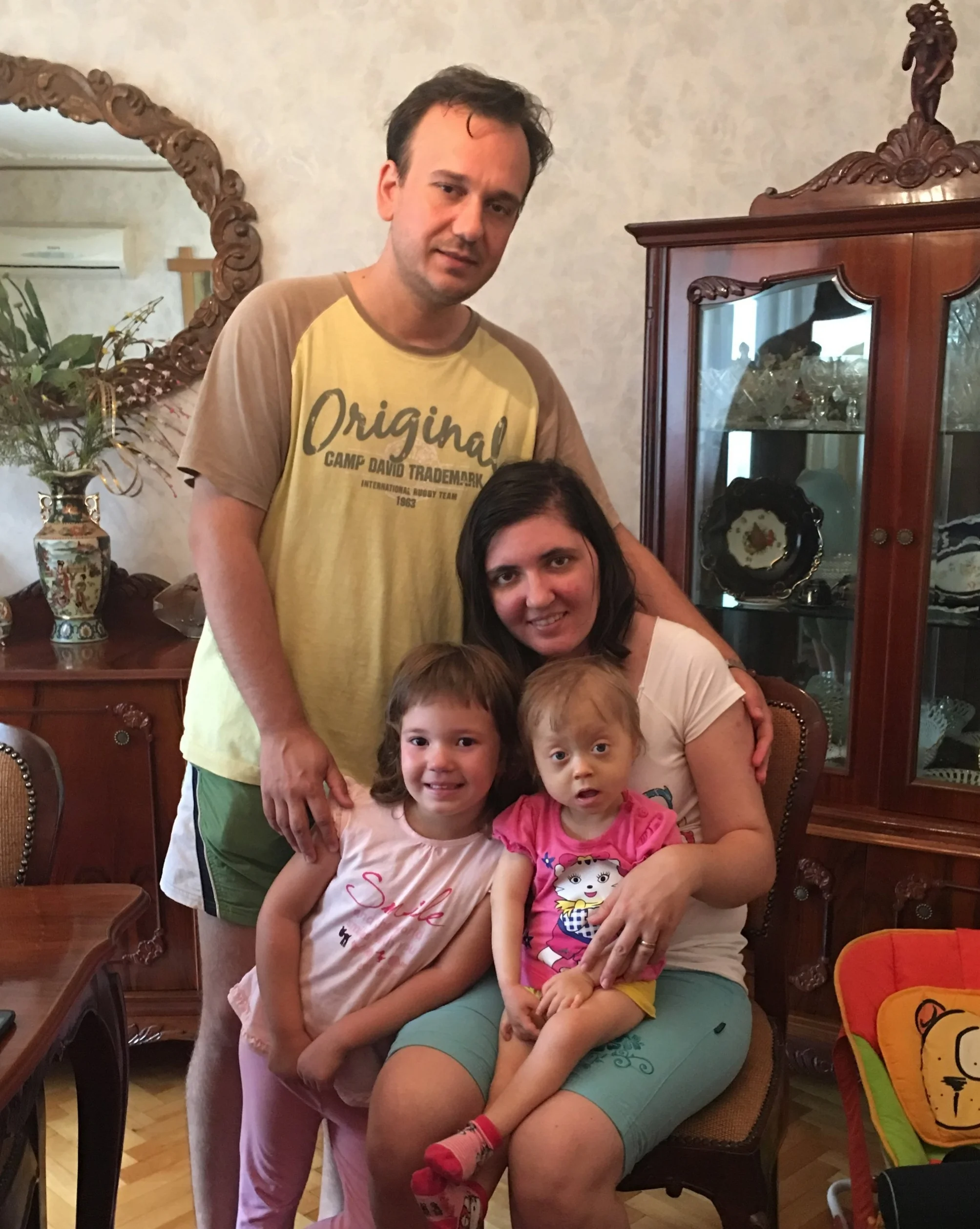 Laurean and Lavinia Vostinar with their daughters, Lidiana and Doriana - Arad, Romania