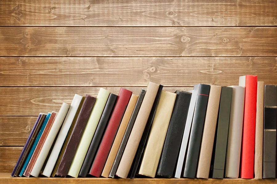 bigstock-Old-books-on-a-wooden-shelf-N-46537213.jpg
