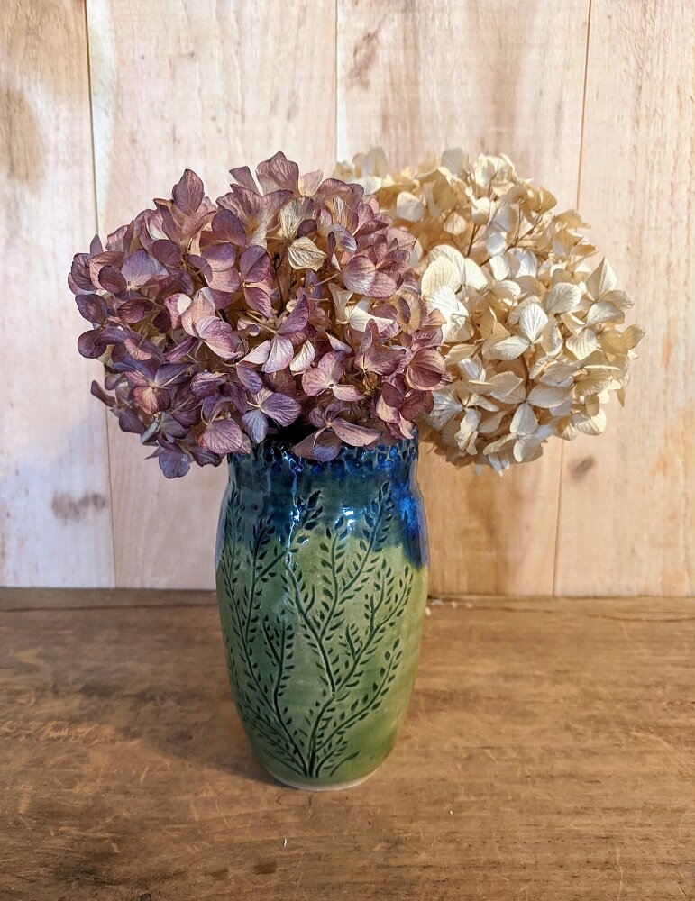 Slender Vase of Dainty Buds