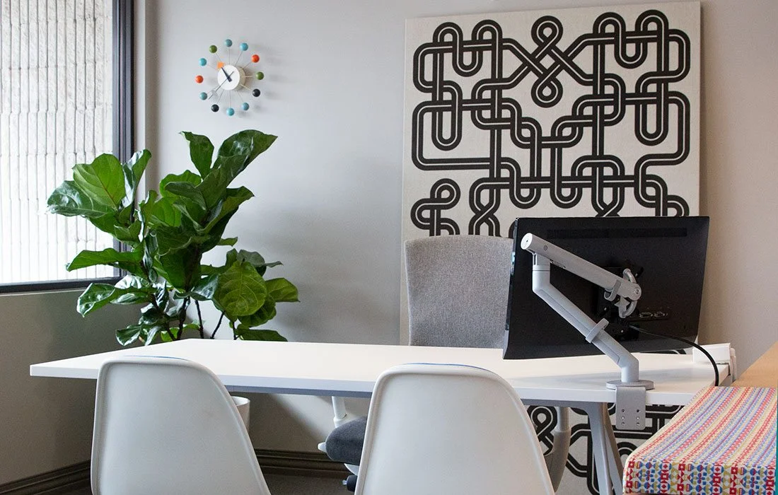 Photo by Linda Huynh Can't commit to a bold wall color? Try incorporating small pops of color. Even a big, green plant adds brightness and life to a room. Purchase Photo