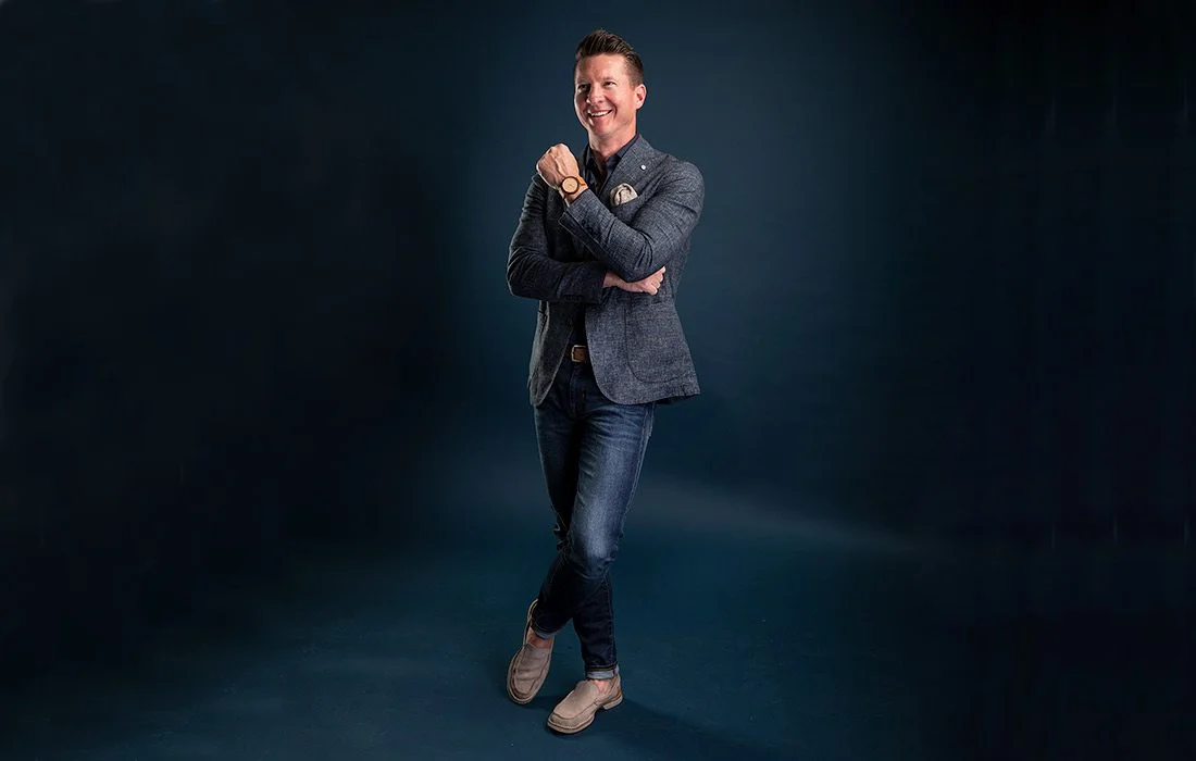 Photo by Brandon Alms A button-up shirt and a jacket with a pocket square is Garard’s go-to look. Purchase Photo