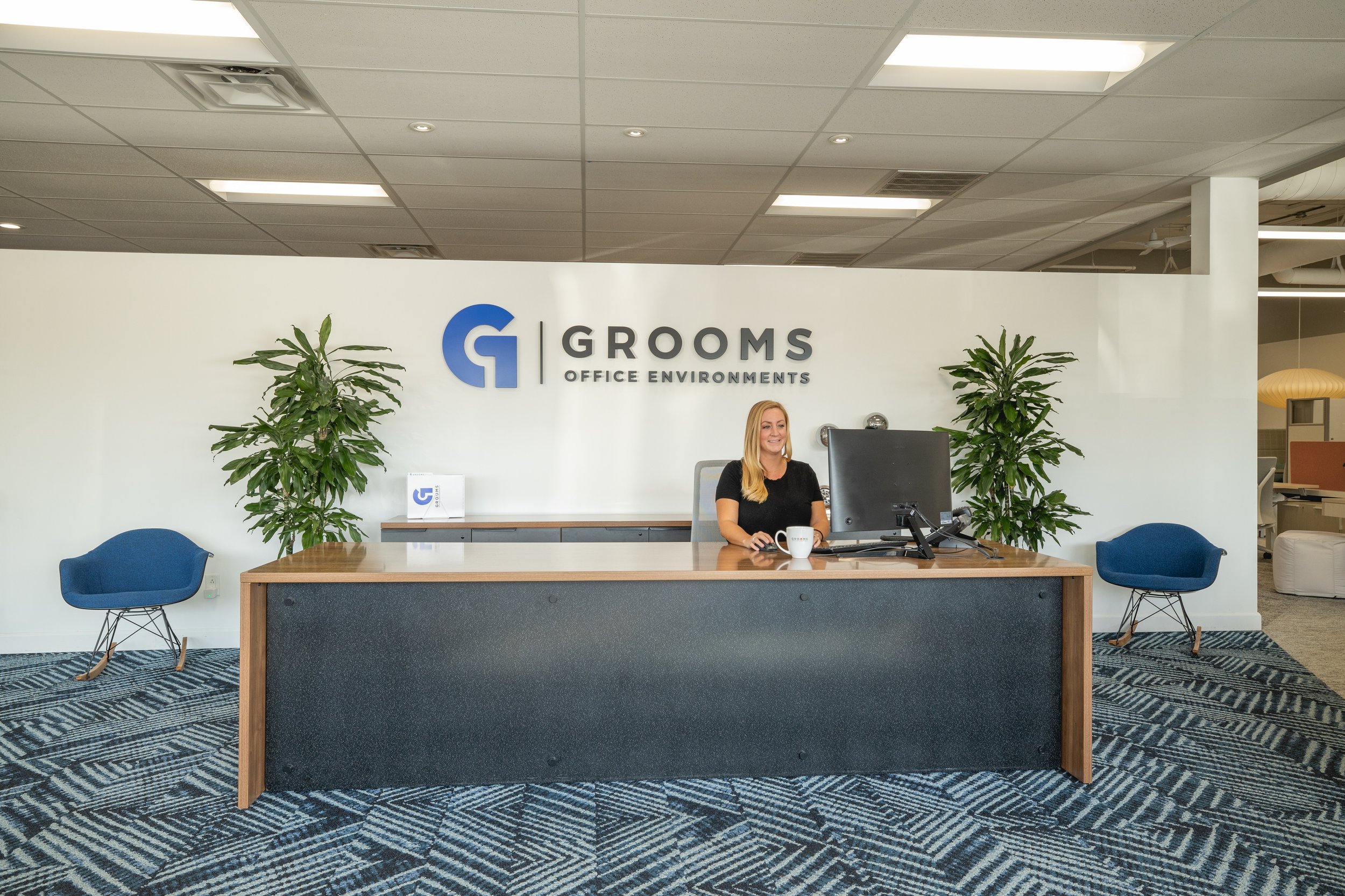Grooms Office Environment-Entrance-Lobby-with Hannah.jpg