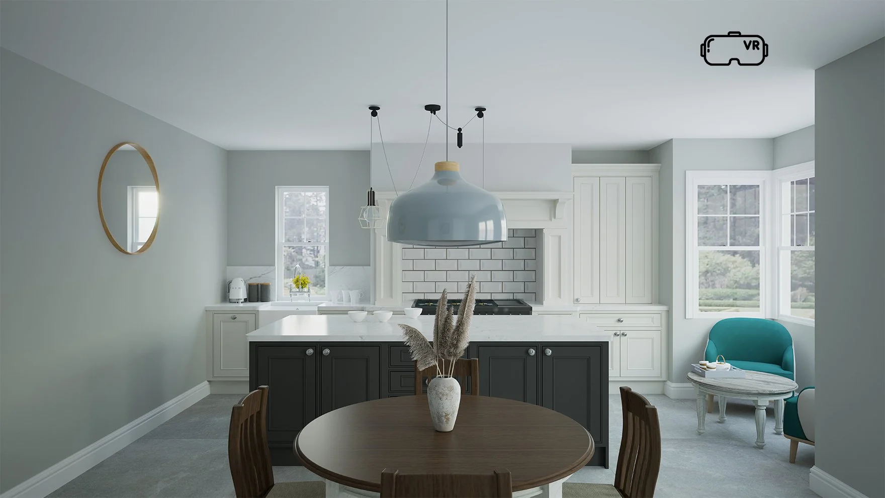 Modern kitchen with a round wooden dining table, white and grey cabinetry, large windows, a teal armchair by the window, and pendant lighting fixtures hanging from the ceiling