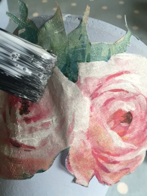 I decoupaged onto chalk painted pots as the lighter background worked better.