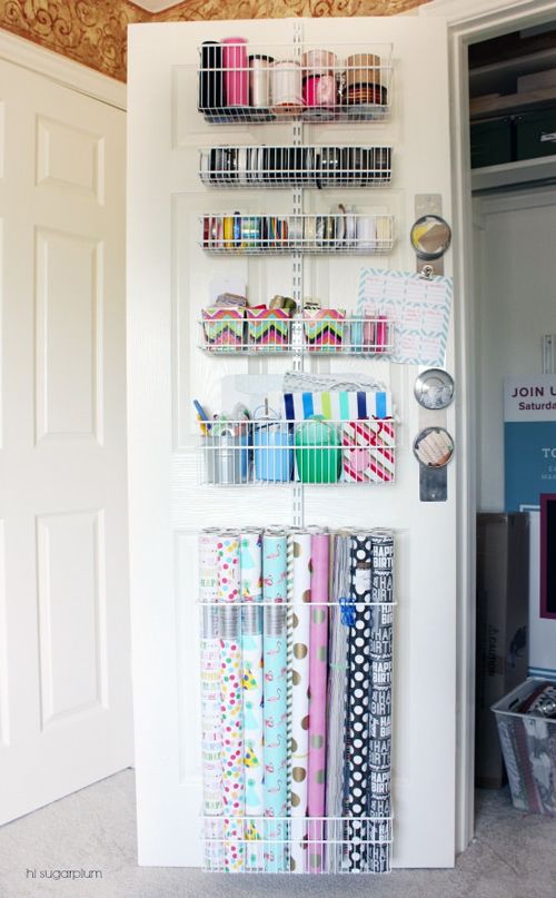  Door rack.    (Photo: iHeart Organizing)      (Product: Elfa wall rack system)   