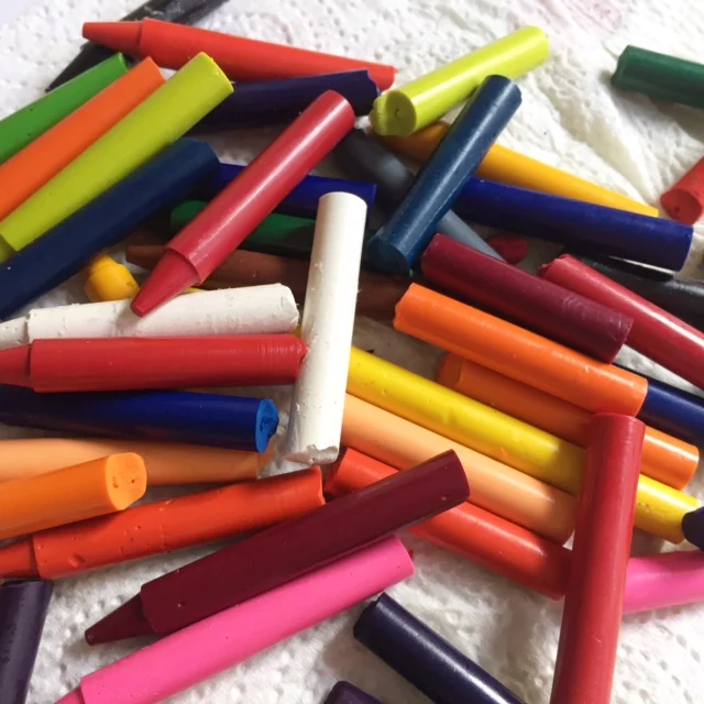 Snap crayons in half as you don't need a whole crayon for melting.