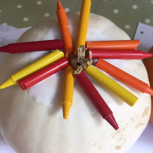 Place crayons on top. Leave the glue to set a bit if you can.