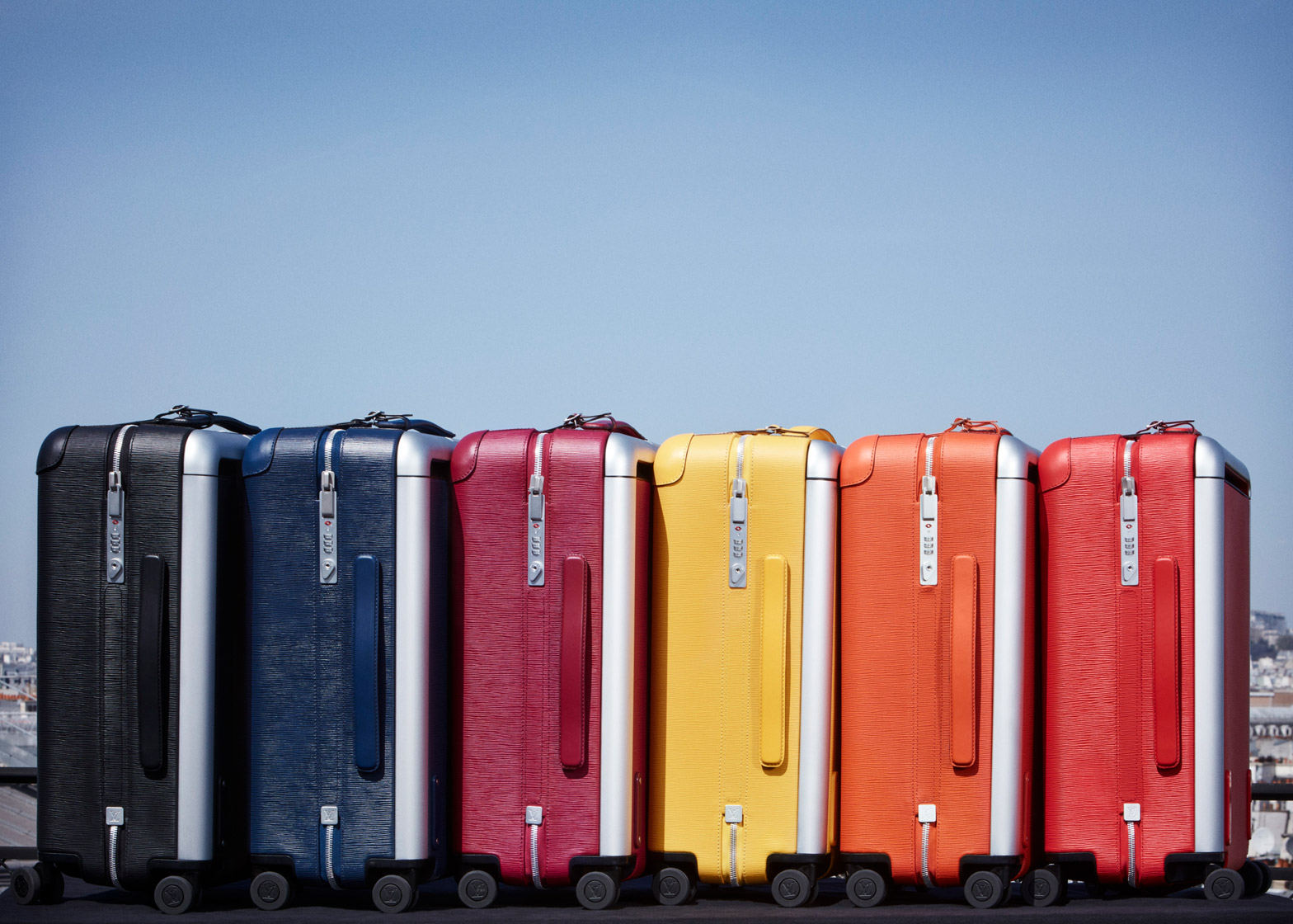 louis-vuitton-lv-rolling-luggage-suitcase-marc-newson-product-design-colour-hard-shell-trunk-lightweight-cabin-bag_dezeen_1568_0.jpg