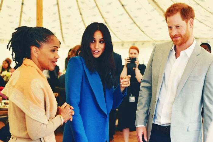 Doria Ragland, Meghan Markle, and Prince Harry at the lunch celebrating Meghan’s new cookbook. Photo: BEN STANSALL/AFP/Getty Images