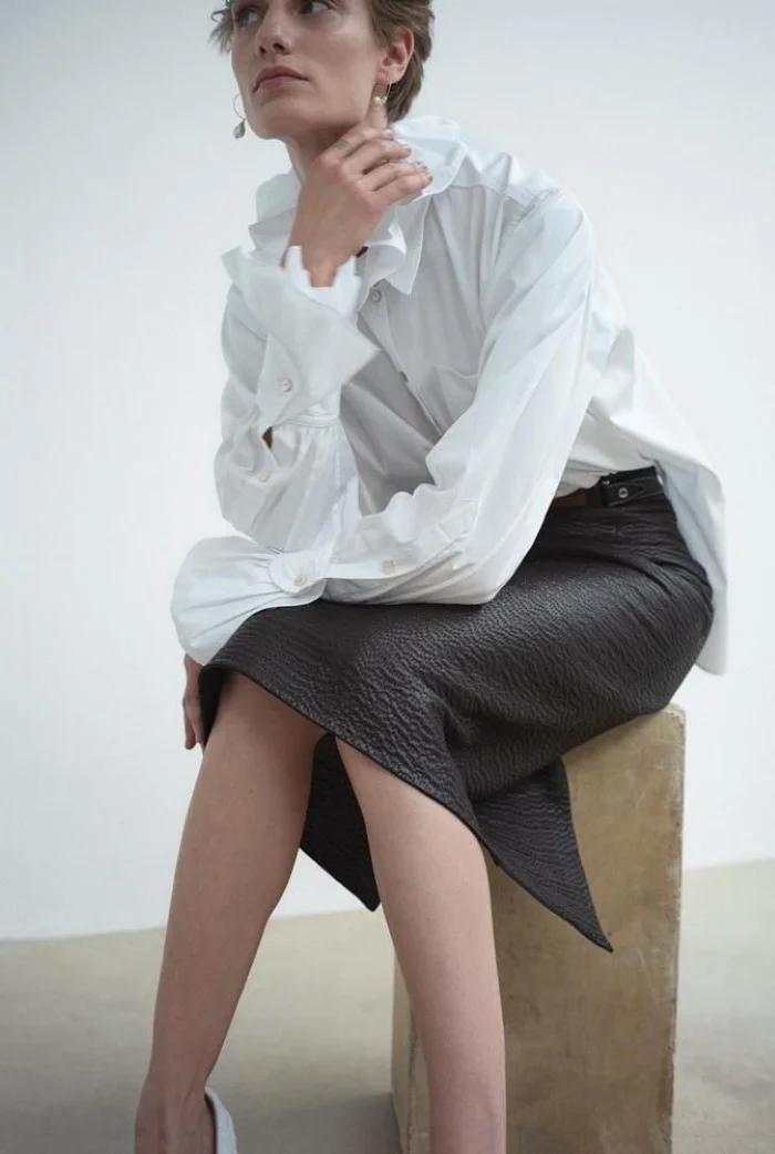 Hillier Bartley blouse, $900, matchesfashion.com , Hermès skirt, $21,400. Veronika Kunz by Bibi Cornejo Borthwick