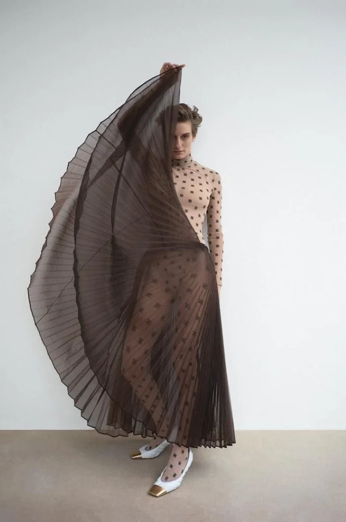 Fendi bodysuit, $770 , skirt, $1,980 , and tights, $140, fendi.com , Bottega Veneta shoes, $1,100, bottegaveneta.com .. Veronika Kunz by Bibi Cornejo Borthwick