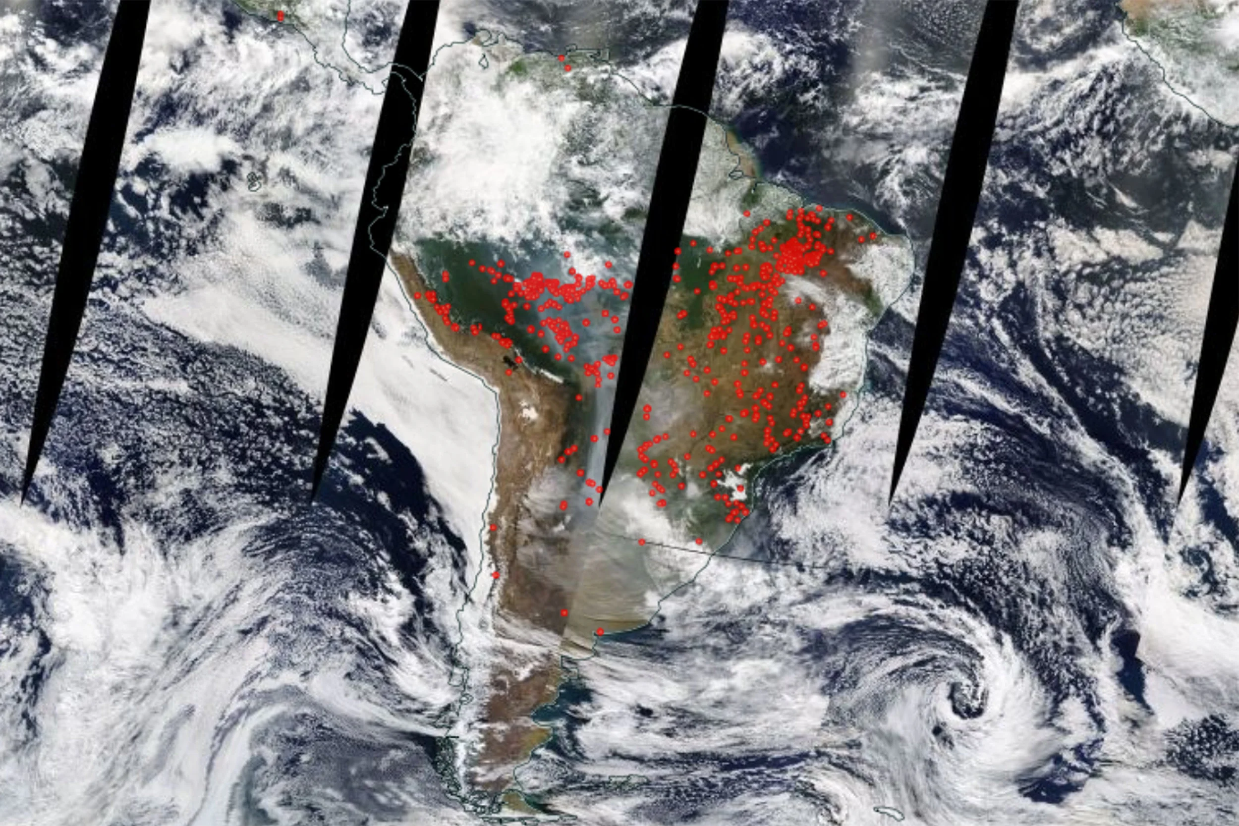 Amazon rainforest from space, with red dots representing a fire or "thermal anomaly" NASA WORLDVIEW