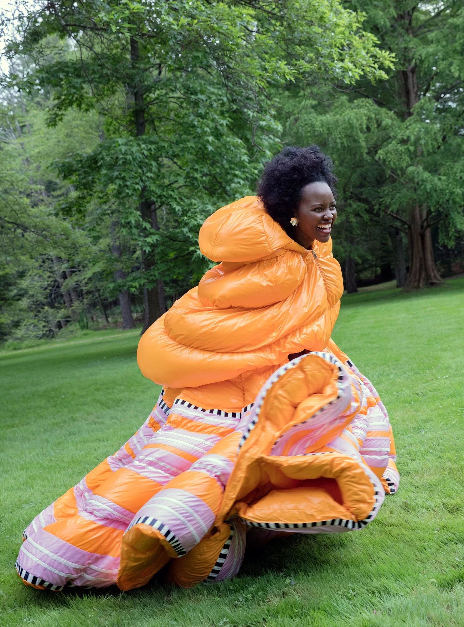 Clothing by 1 Moncler Pierpaolo Piccioli; earrings by Irene Neuwirth. LUPITA NYONG’o. PHOTOGRAPH BY JACKIE NICKERSON; STYLED BY SAMIRA NASR.
