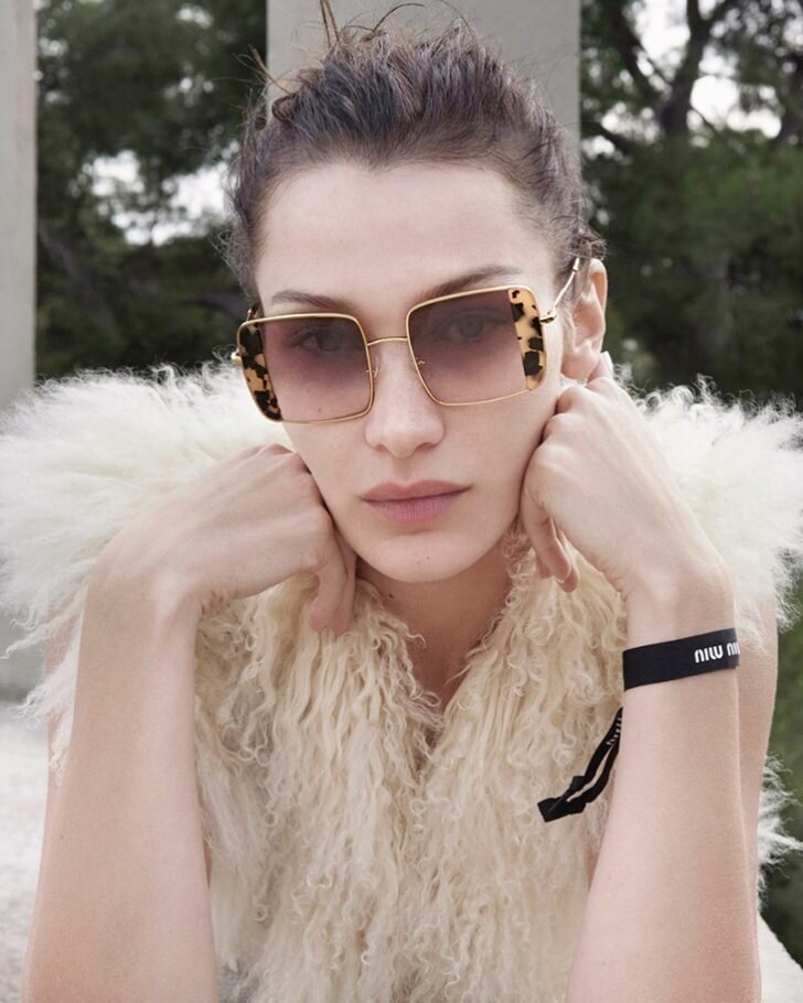  Bella Hadid wears Miu Miu Noir sunglasses in image by Lynette Garland. 