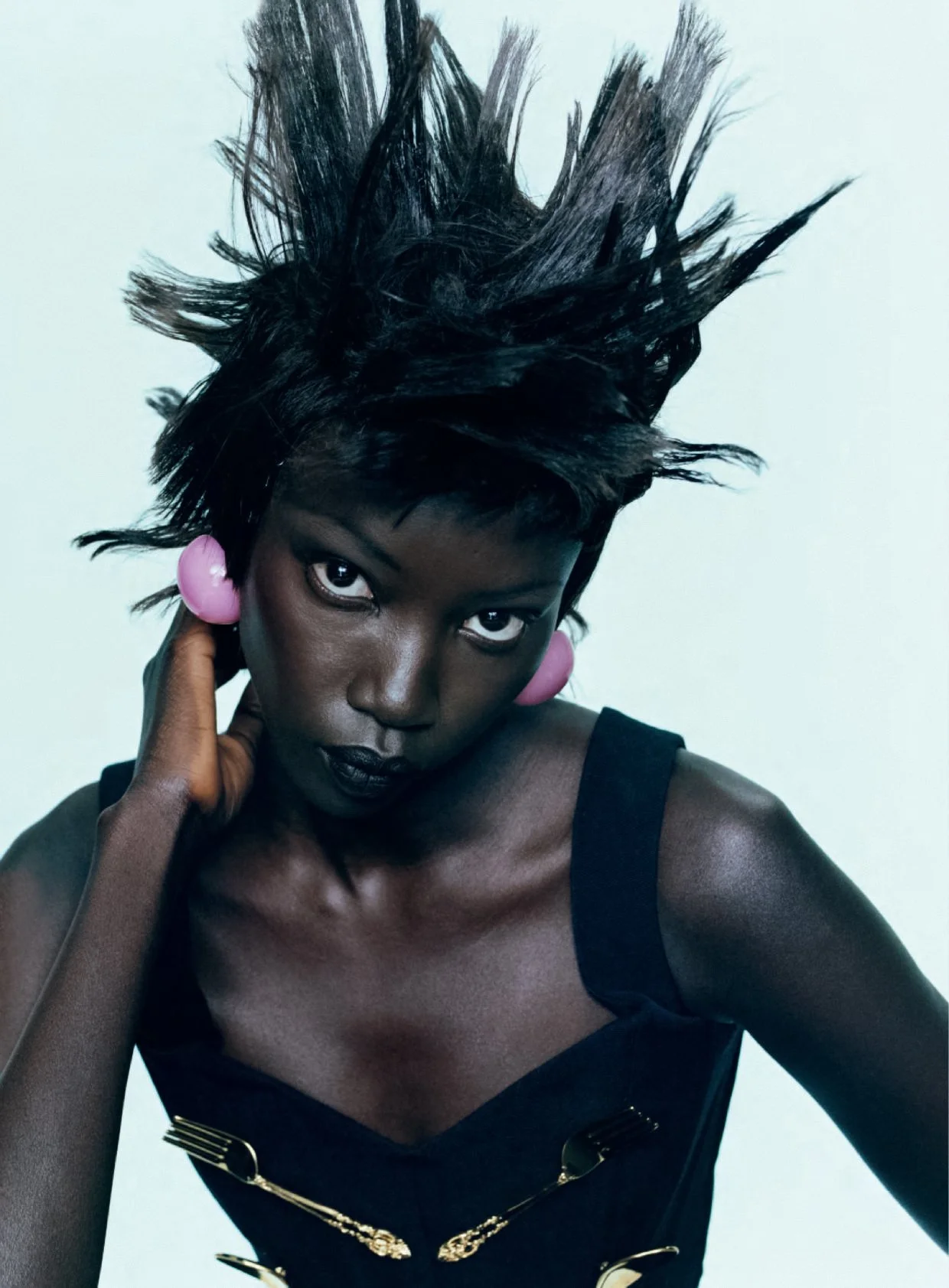 Anok Yai in 'Spell It Out' for British Vogue December 2022 by Oliver Hadlee Pearch