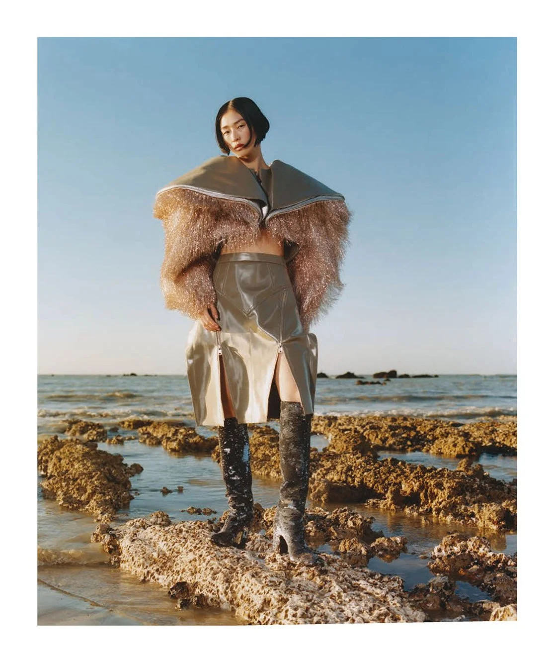 Chu Wong Wears Louis Vuitton at Sea for Vogue China December 2022