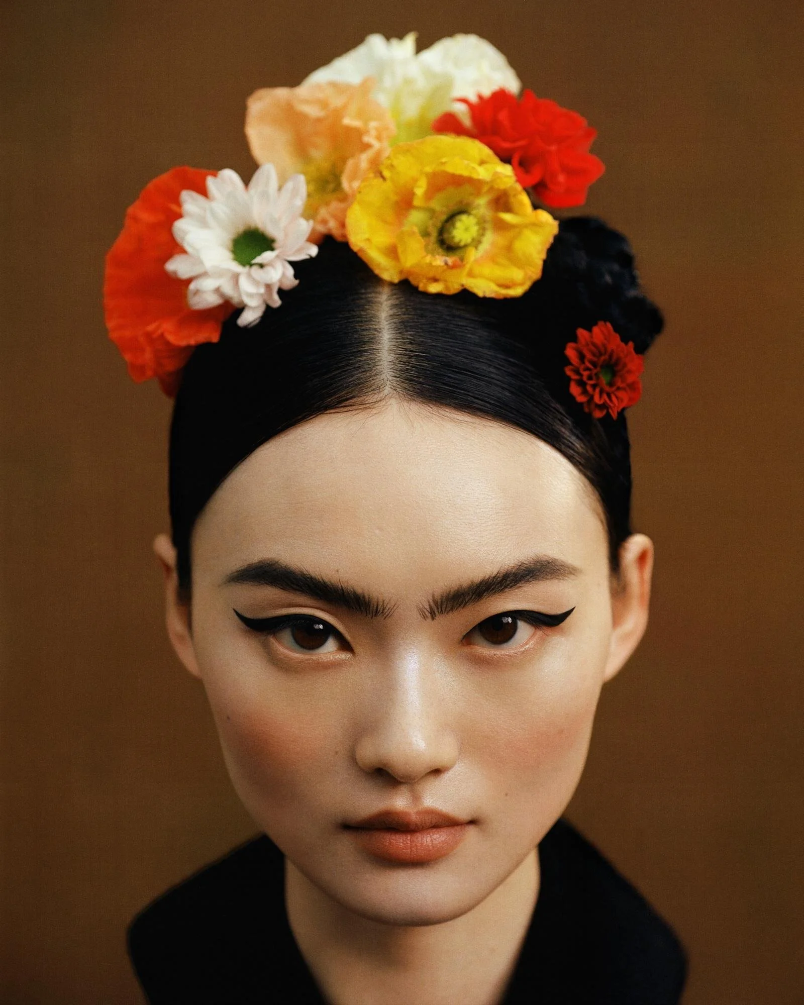  He Cong for Marie Claire China inspired by artist  Frida Kahlo self-portraits . 