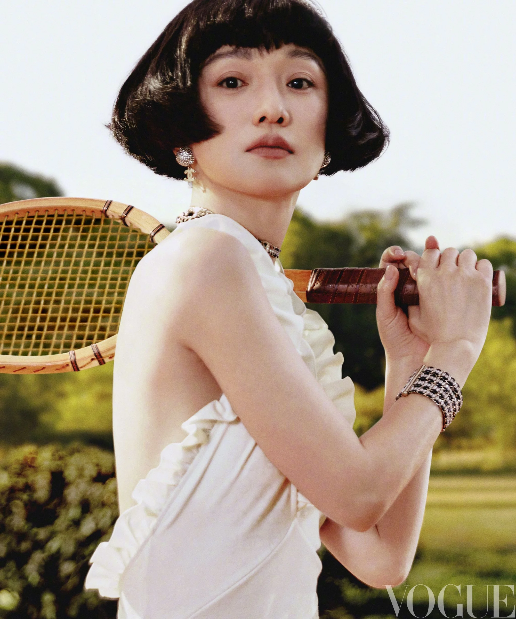 Zhou Xun Has Game, Lensed in Country Club Elegance by Jumbo Tsui for Vogue China