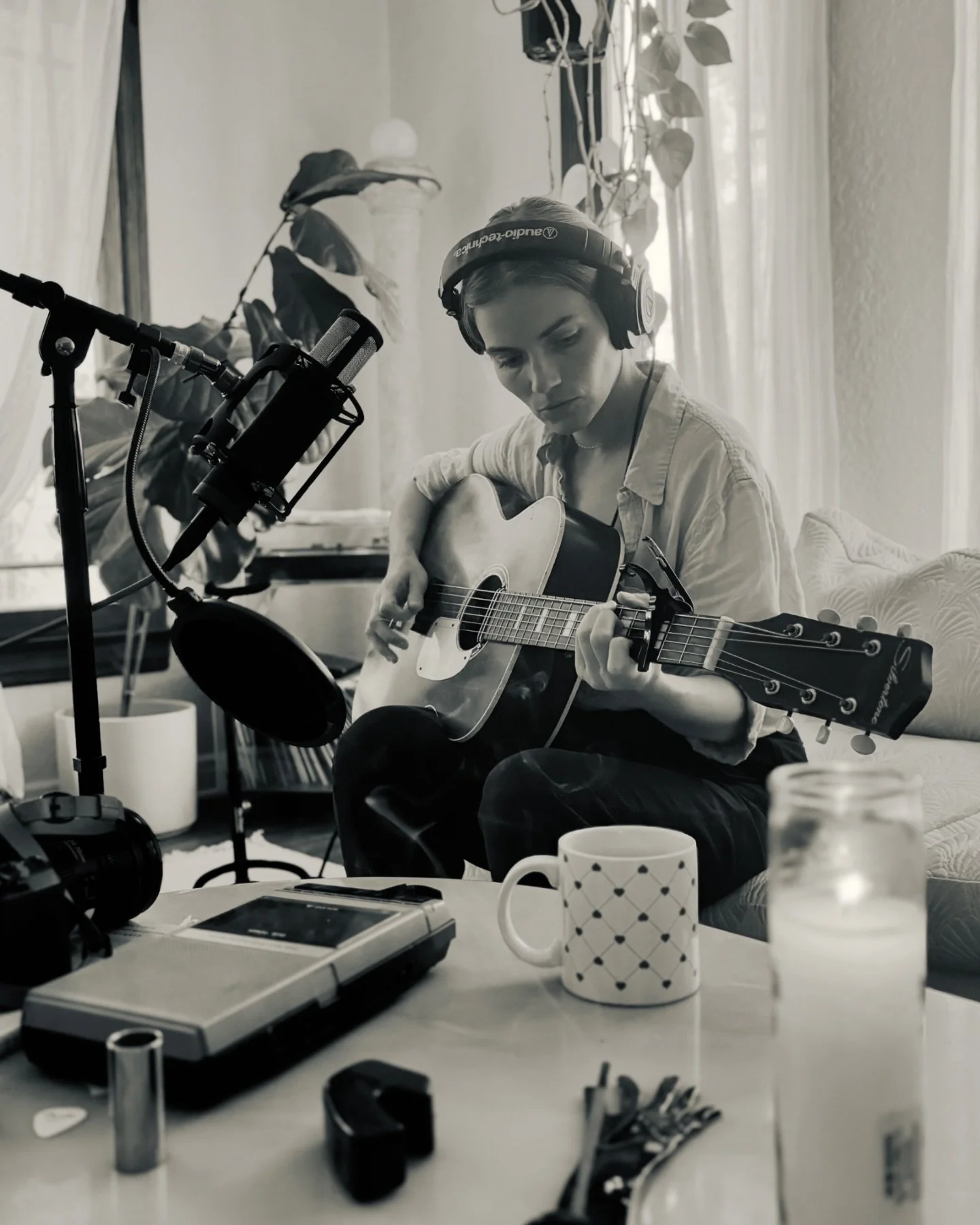 photos from my los feliz residency with @khushimusic. here i'm playing his baritone Silvertone acoustic with a rubber pickup. we're recording on a Manley Reference microphone that honestly is just incredible. and that's his Rickenbacker 12-string in 