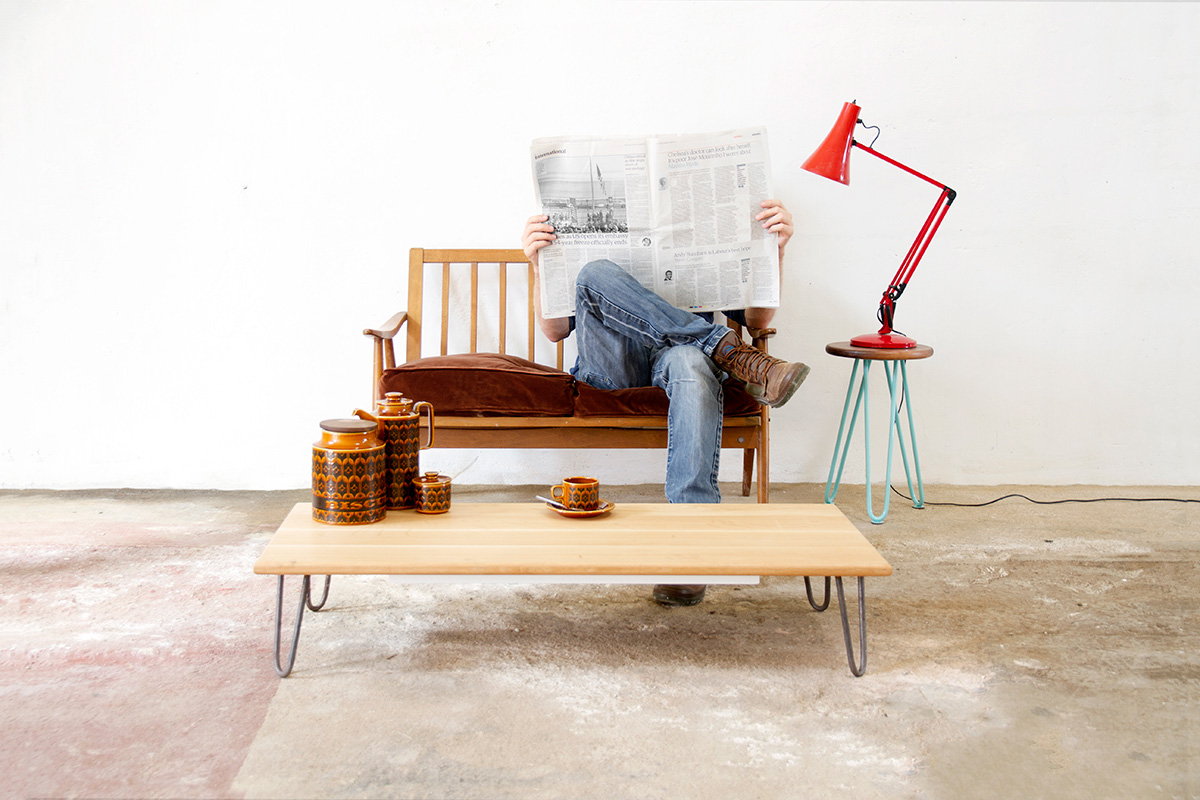Cord Industries hairpin leg coffee table in oak with lacquered steel legs - shown in lounge scene with hairpin leg side table and two seater love seat.