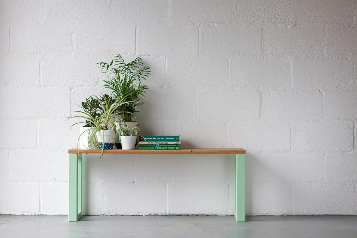 Cord_Industries_Nola_Bench_pistachio_plants__books_03_web.jpg