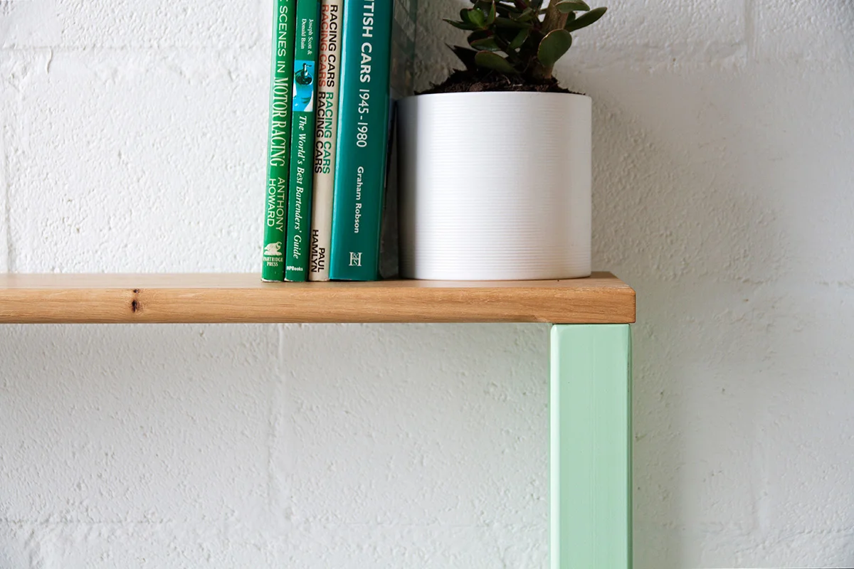 Cord_Industries_Nola_Bench_pistachio_plants__books_04_web.jpg