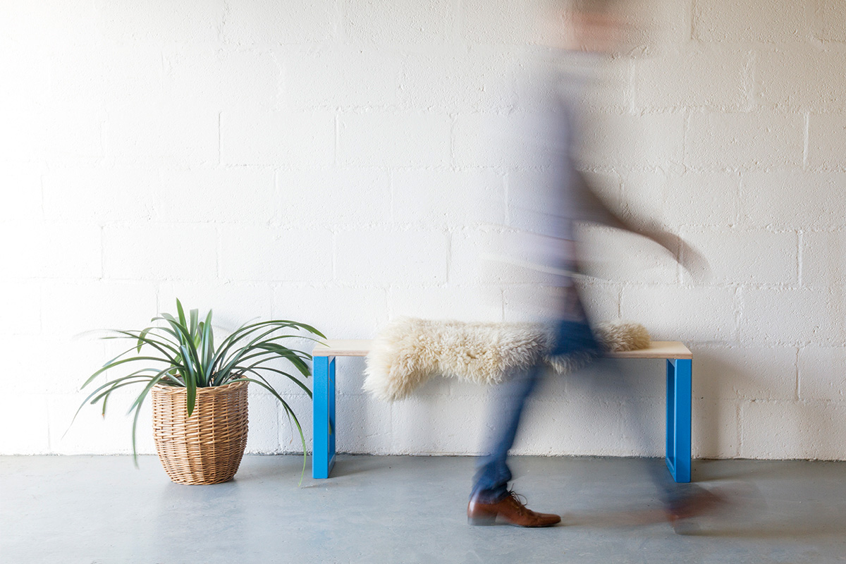 Cord_Industries_Nola_Bench_Blue_symmetrical_blurred_figure_web.jpg