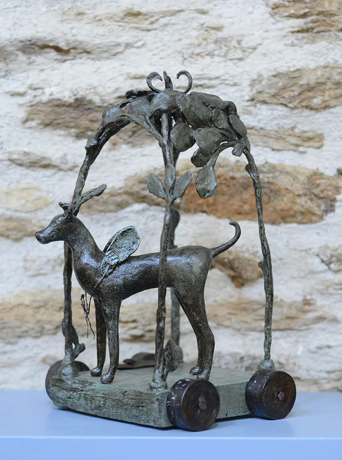 Winged dog in an arbour, mixed media, 36x20x23 cm
