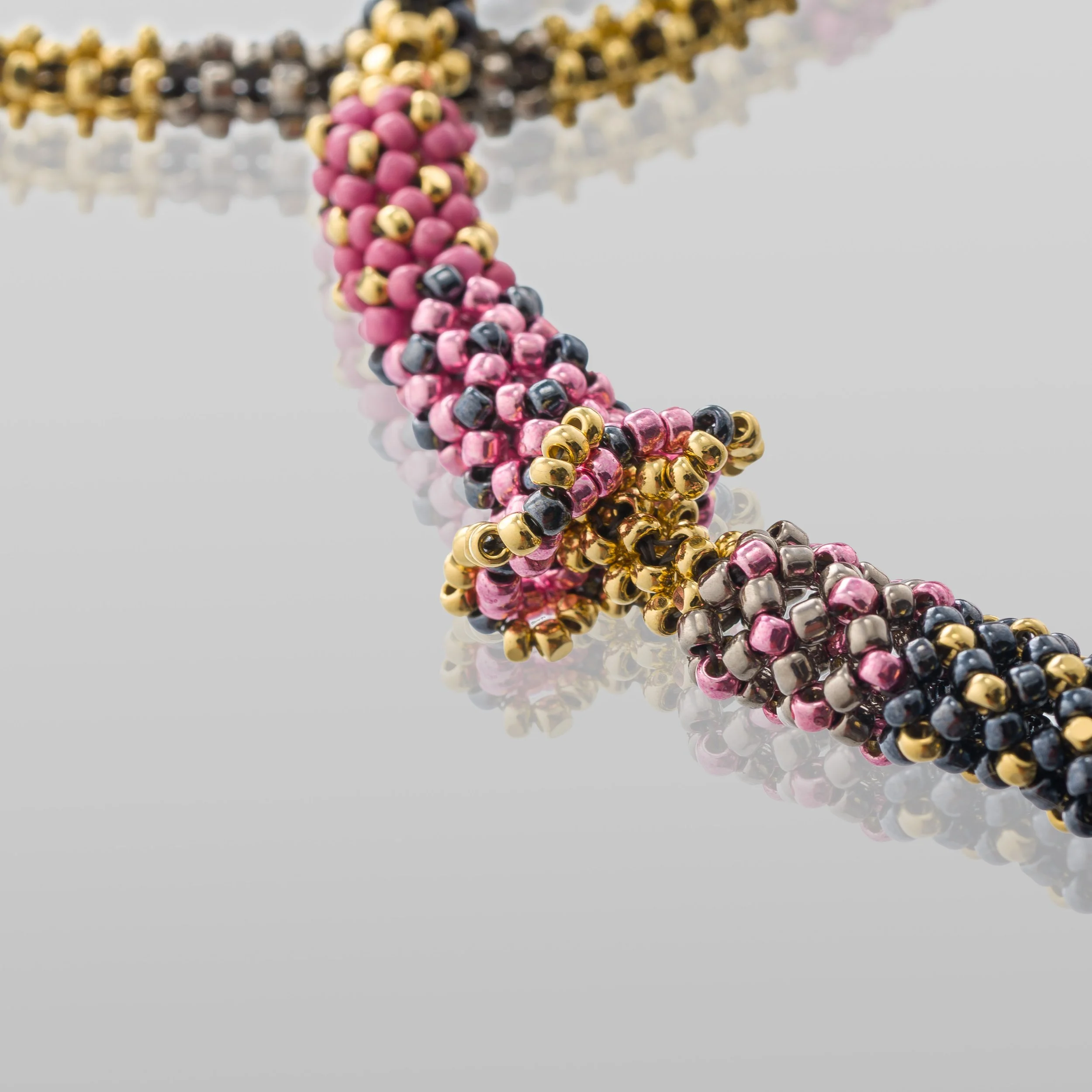 detail of Tiny Hands Lariat.jpg