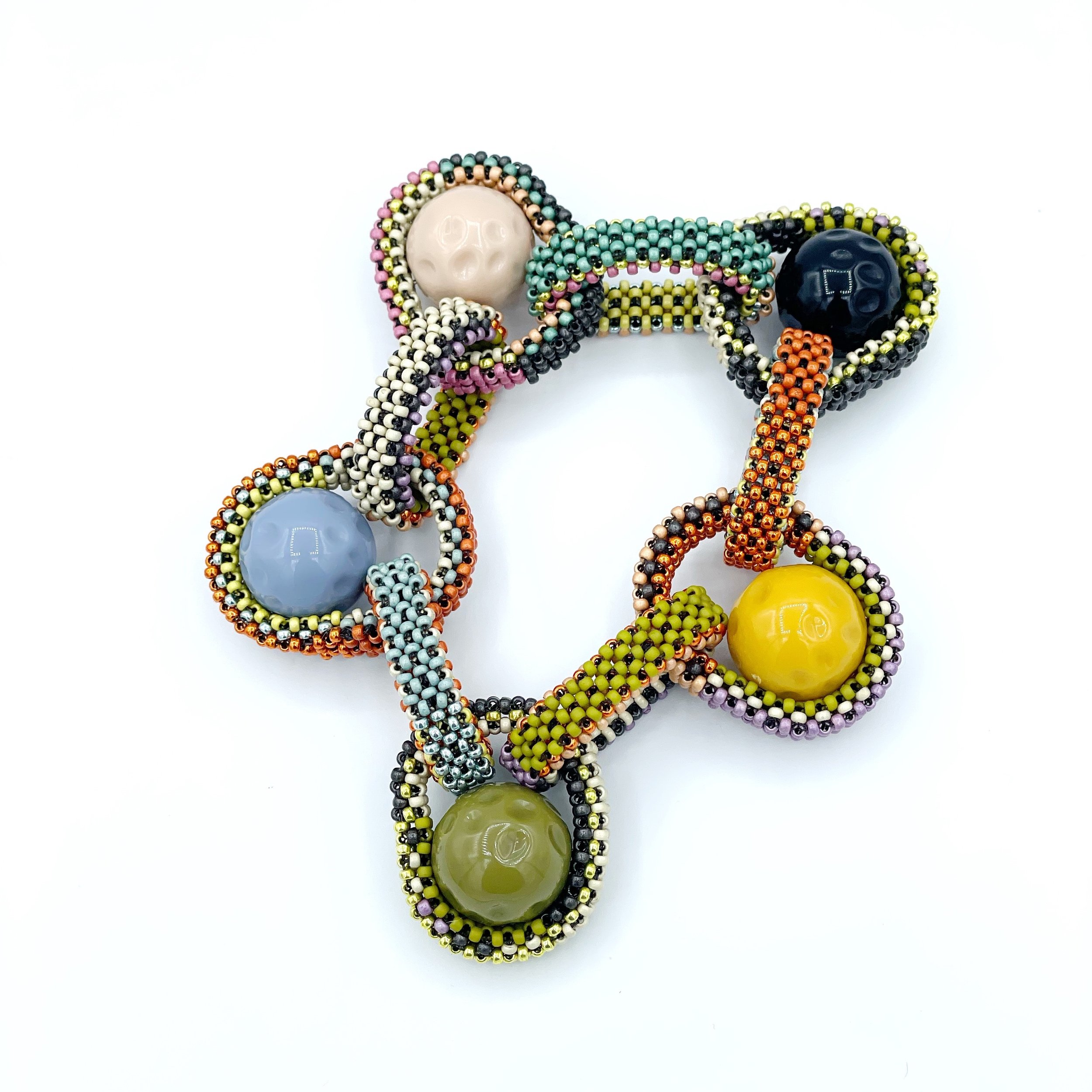 pastel pods chain soft bangle.jpeg