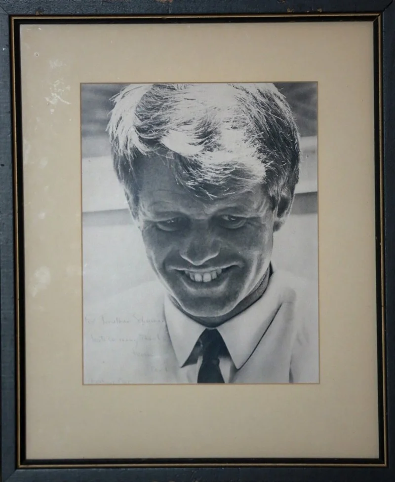 A black-and-white framed photo belonging to Jonathan Schuman of Lake Clarke Shores. “This was the last formal photo of Robert F. Kennedy, which is why Ethel sent it out to the staff as a Christmas present in 1968,” he said. (Bruce R. Bennett / The Palm Beach Post)