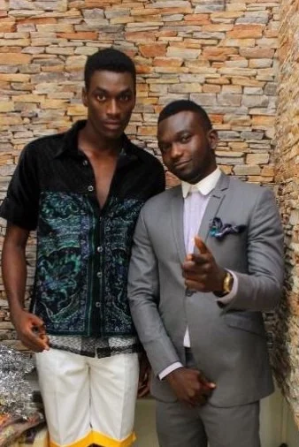 Deji Eniola with a model