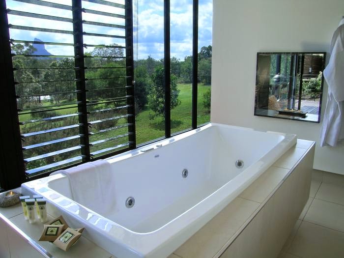 The amazing view from the bath at Glass on Glasshouse (the water falls from the roof! Amazing!)